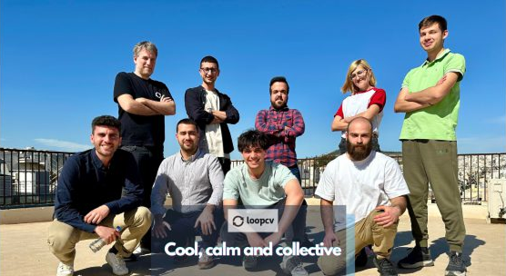 A group of nine people posing together outdoors on a sunny rooftop, with the LoopCV logo and the text "Cool, calm and collective" overlaid at the bottom.
