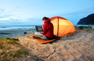 digital nomads; working on the beach; camping and working; flexible 